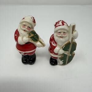 Vintage Santa Clause Christmas 2 Salt Pepper Shakers Holding Musical Instruments